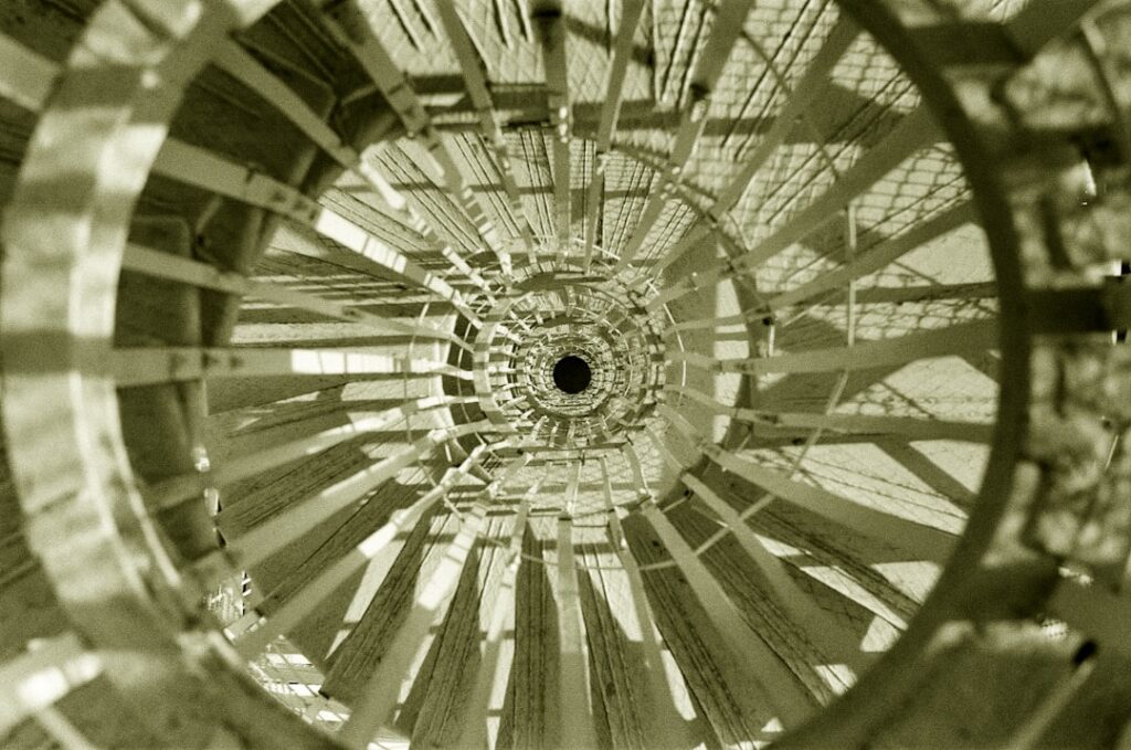 a close up of a circular object in sepia
