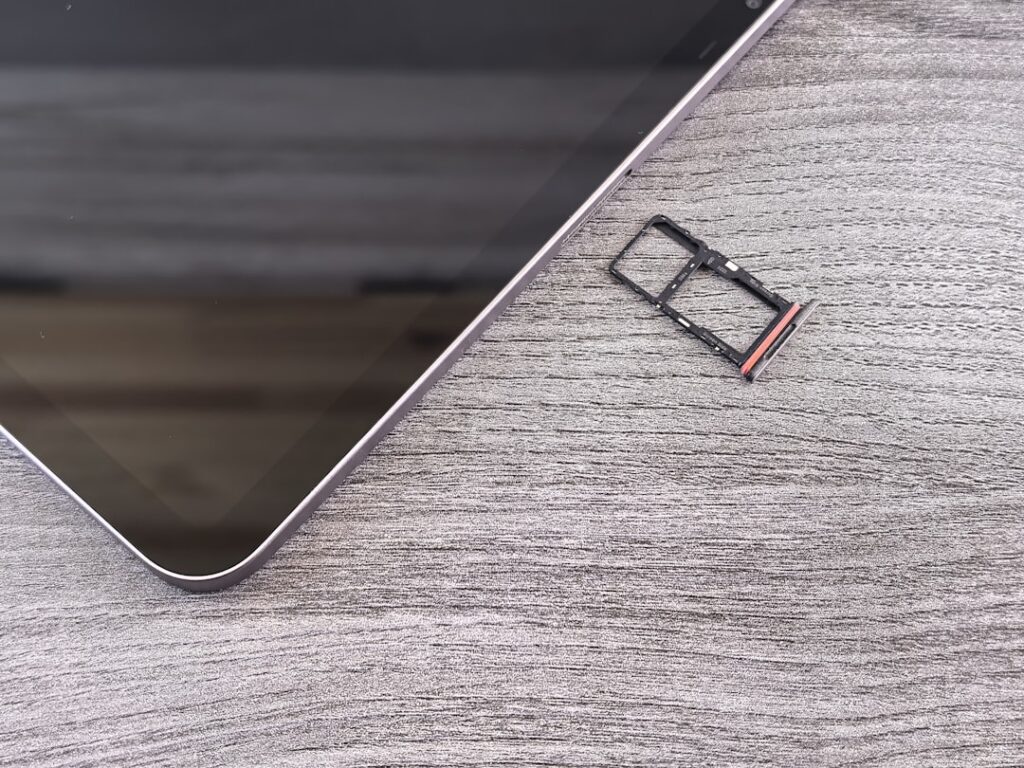 Smartphone with sim card tray removed