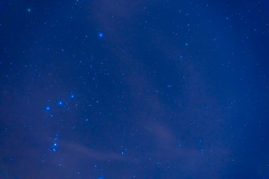 blue sky with stars during night time