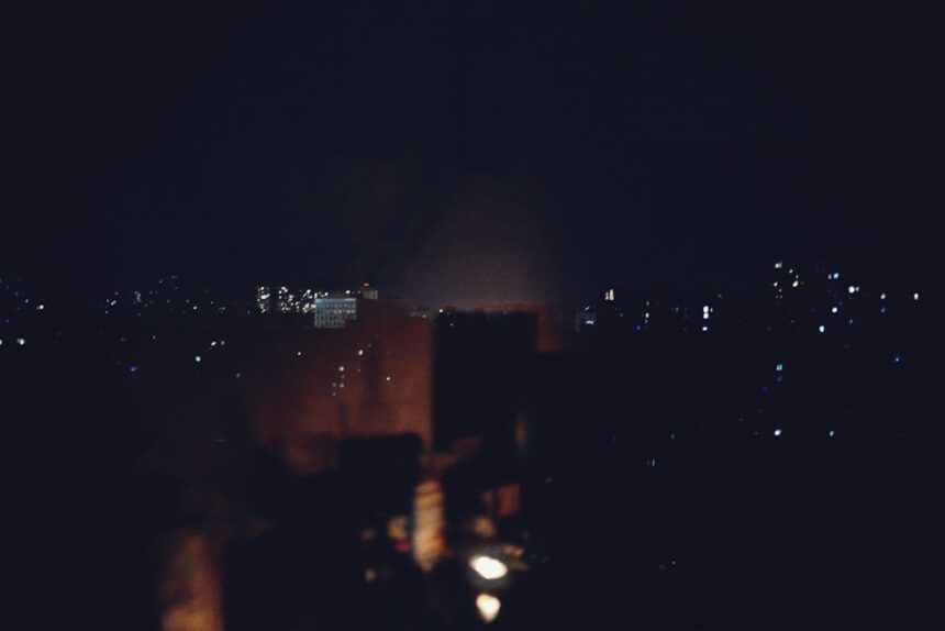 City lights twinkling at night from afar