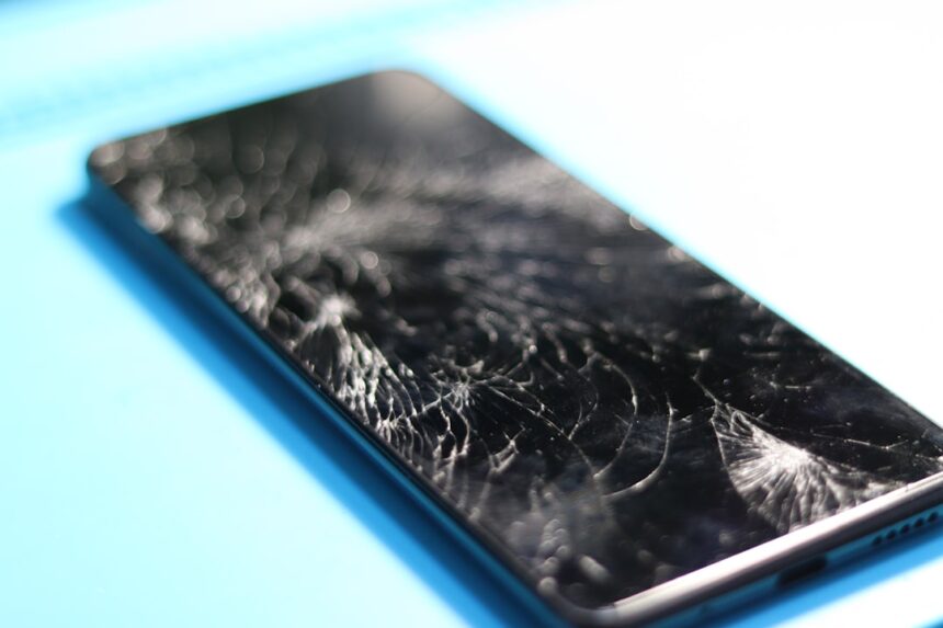 A smartphone with a cracked screen.
