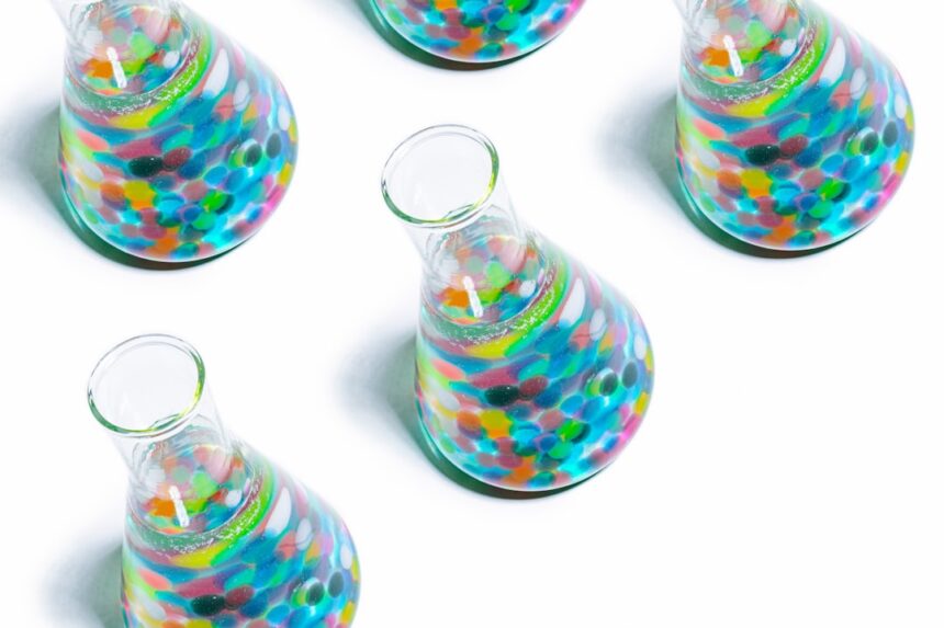 clear glass jar with multi colored heart shaped candies