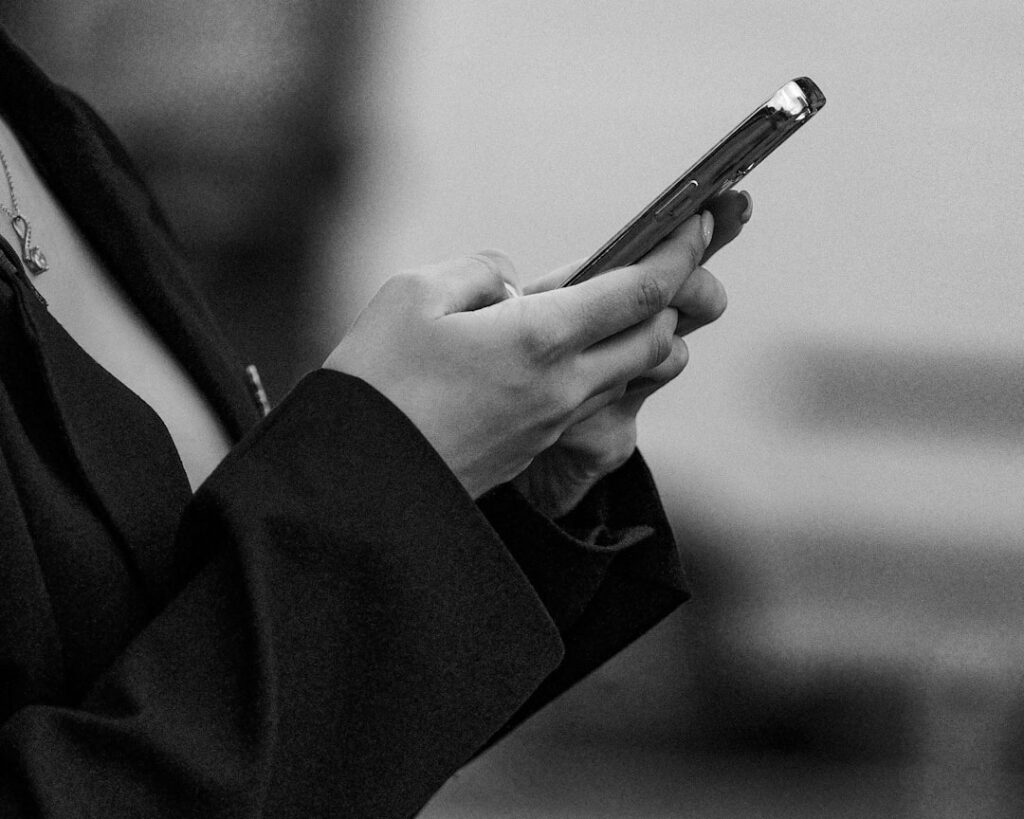 Person using a smartphone with both hands