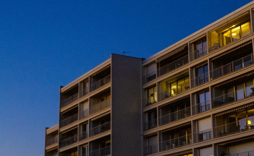 brown concrete building under blue sky during daytime