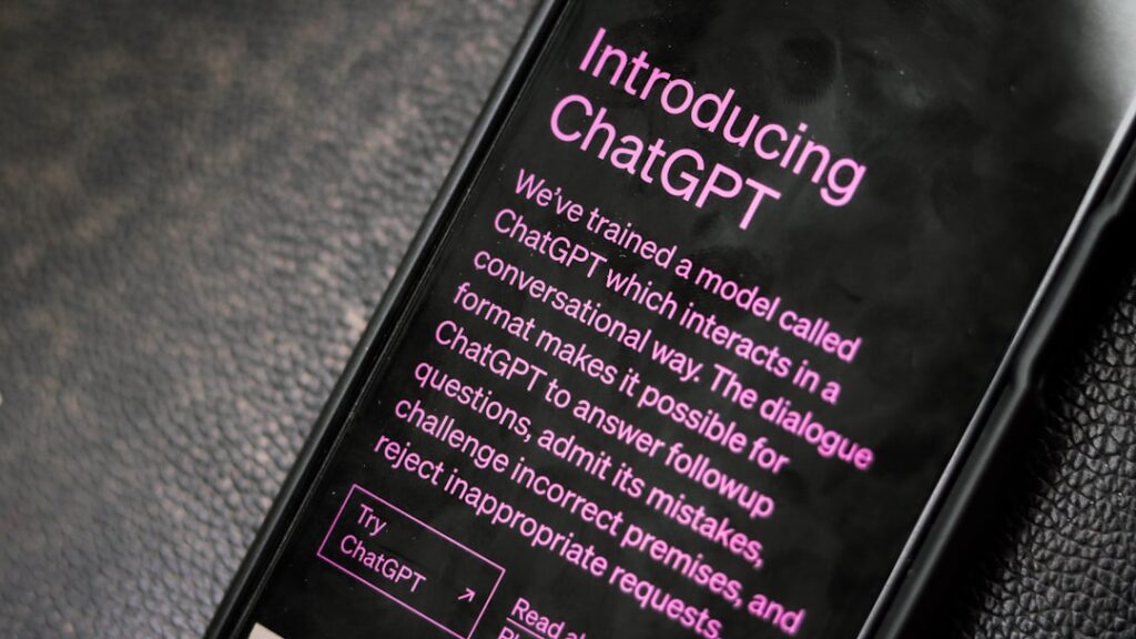 a close up of a cell phone on a table