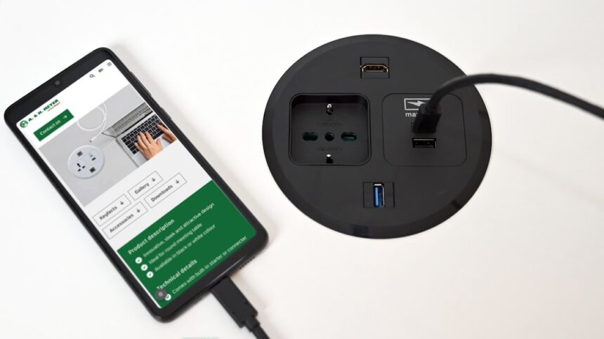 A smart phone plugged into a power strip