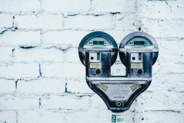 a parking meter covered in snow
