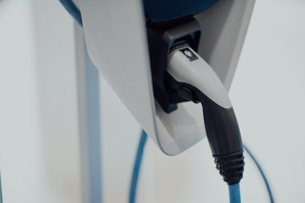 black usb cable plugged in white socket