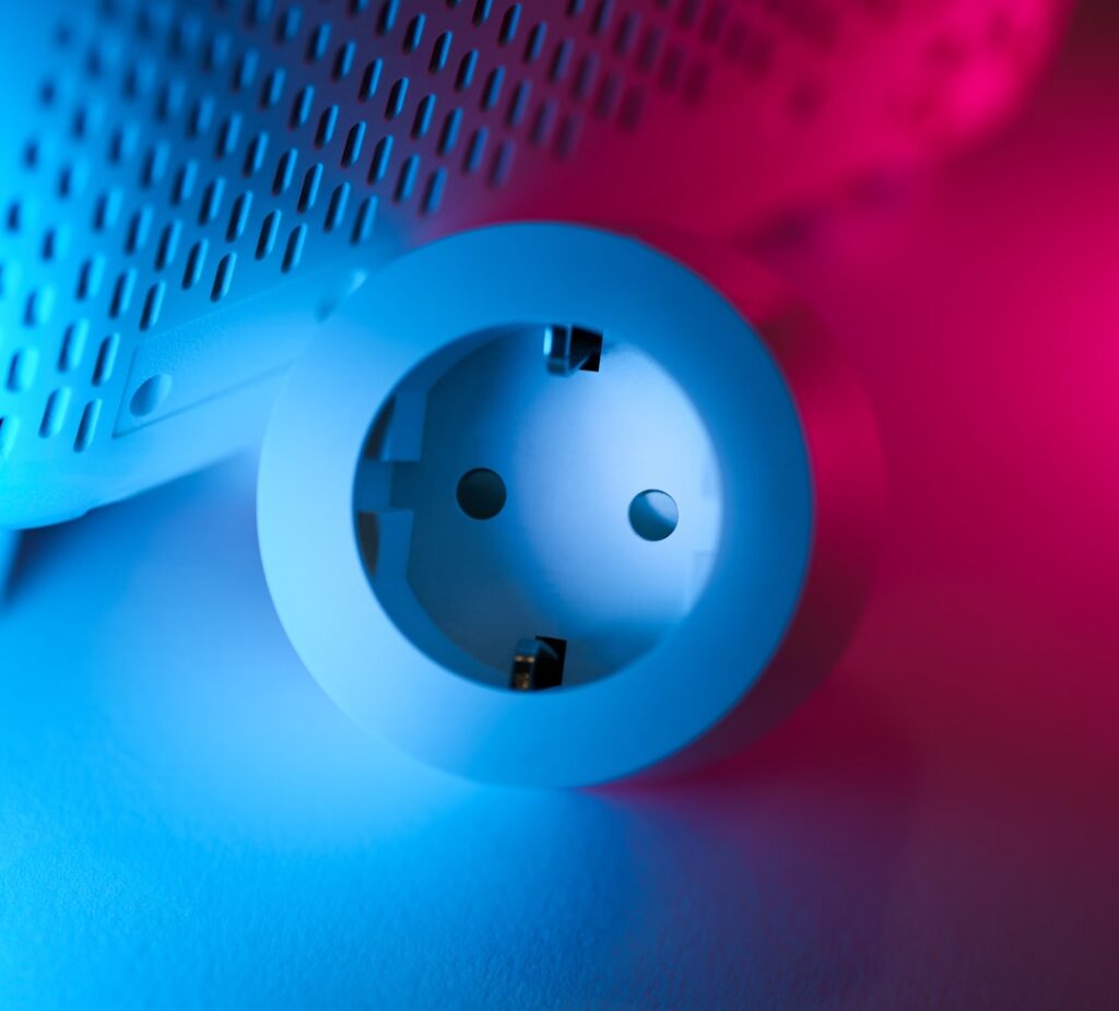 A close up of a blue and pink object on a table