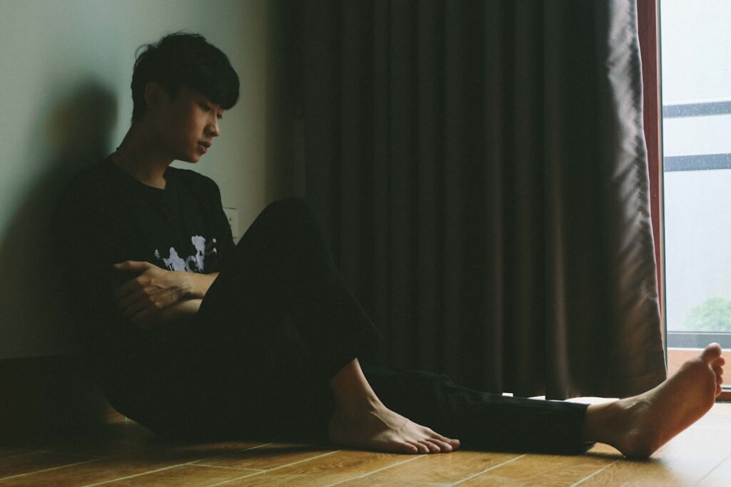 a person sitting on the floor