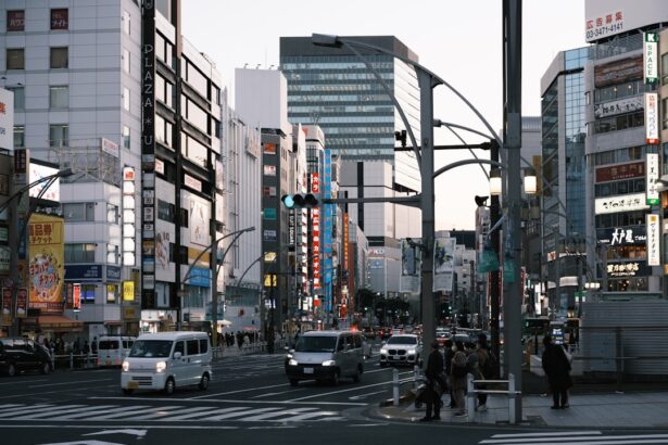 A city street filled with lots of tall buildings