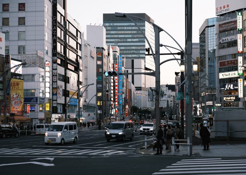 A city street filled with lots of tall buildings