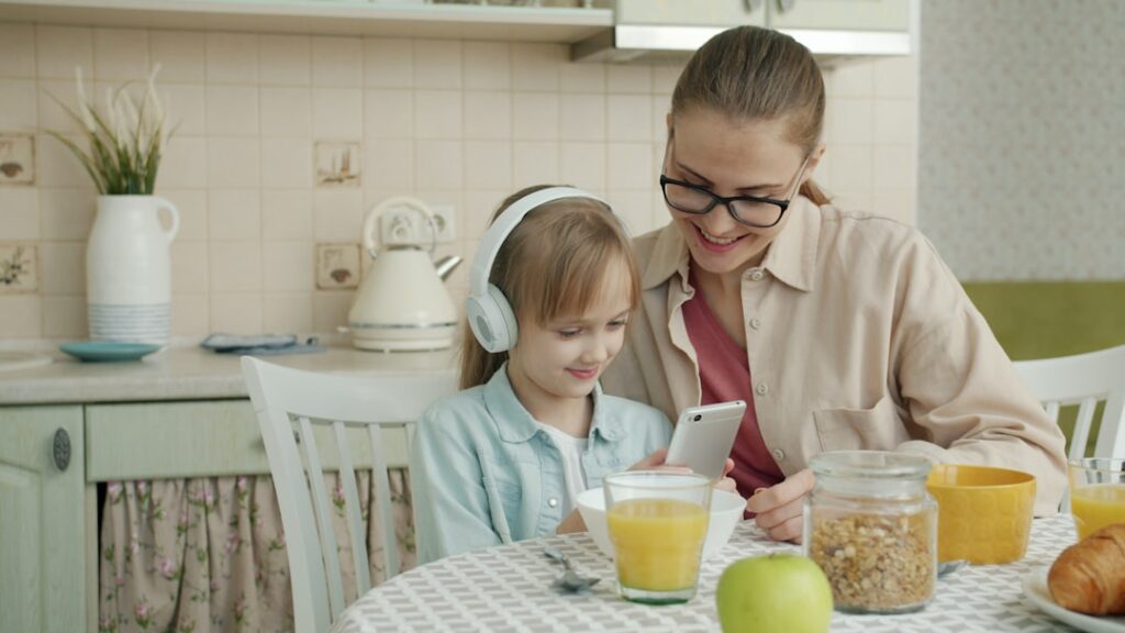 Mother and daughter listen to music together
