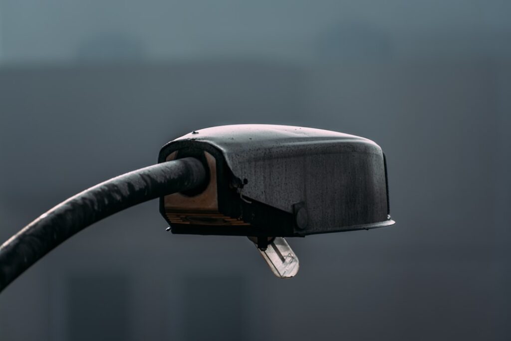 a close up of a street light with a blurry background