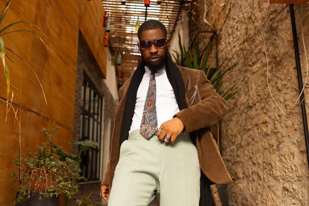 Man in stylish suit and sunglasses