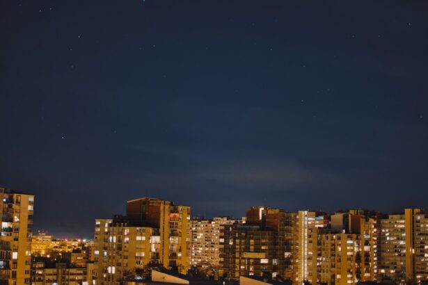 Nighttime cityscape with visible stars.