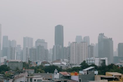 A view of a city from a rooftop top