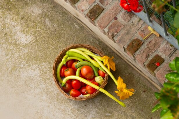 A basket filled with lots of vegetables next to a brick wall
