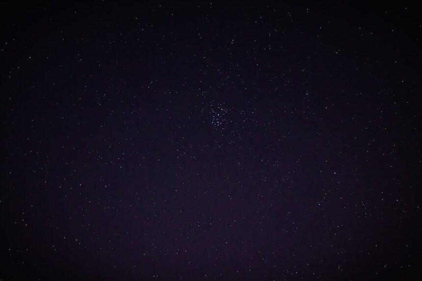 a night sky with a few stars in it