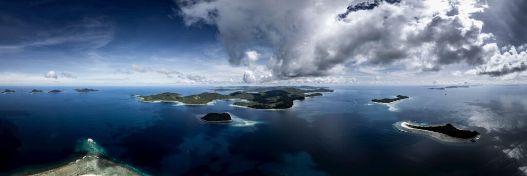 Archipelago with islands in a vast blue ocean.