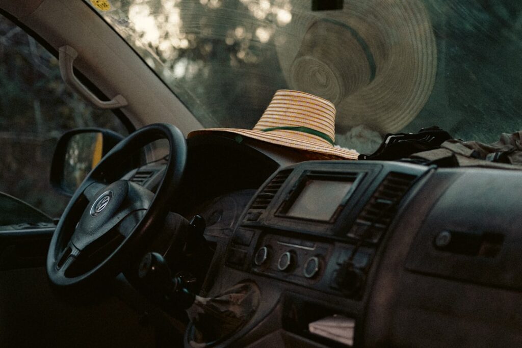 Straw hats inside a vehicle dashboard