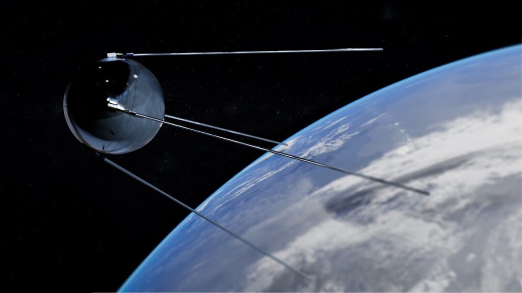 Satellite orbiting earth with clouds below