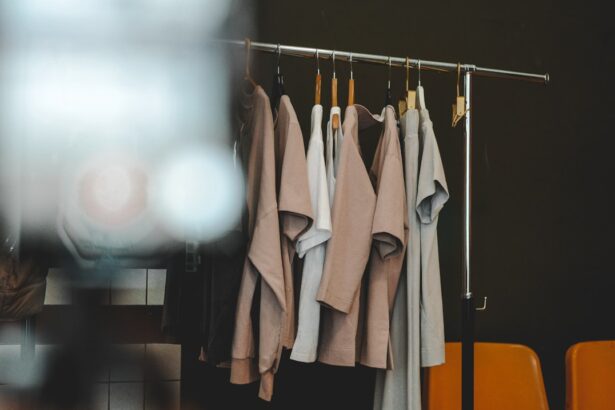 Clothes hang on a rack in a minimalist style.