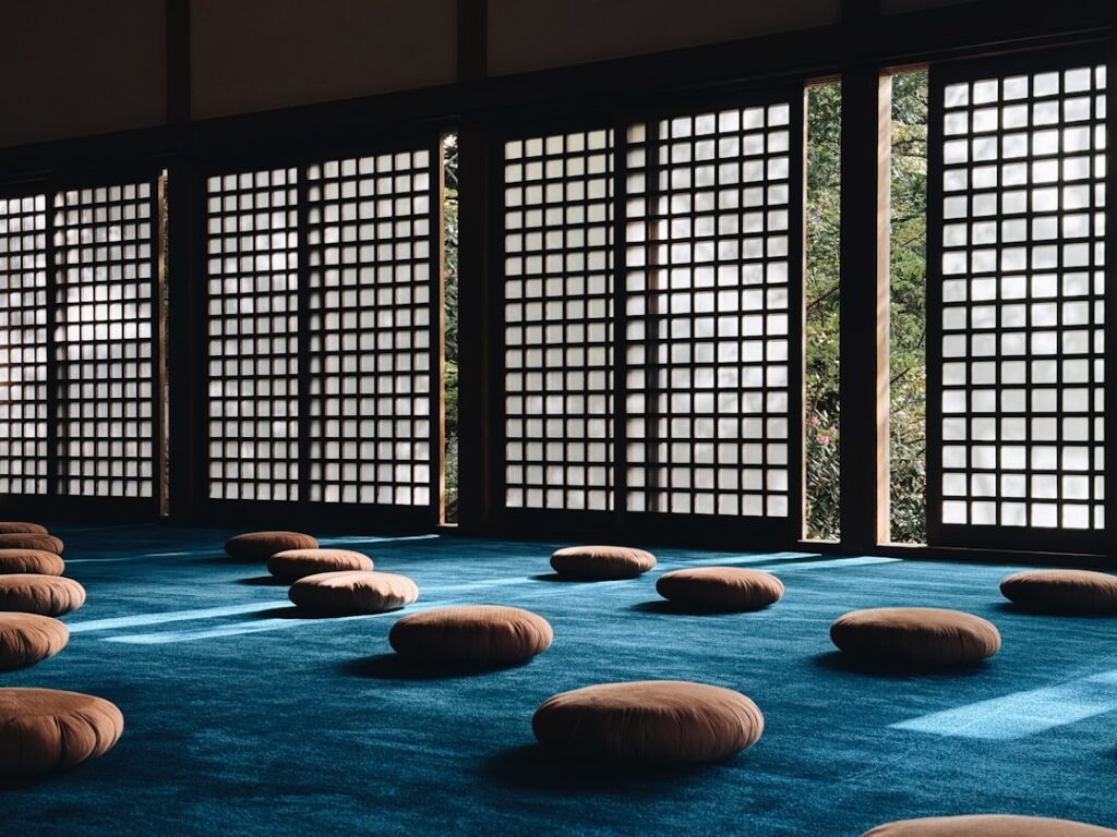 Japanese room with cushions on the floor.