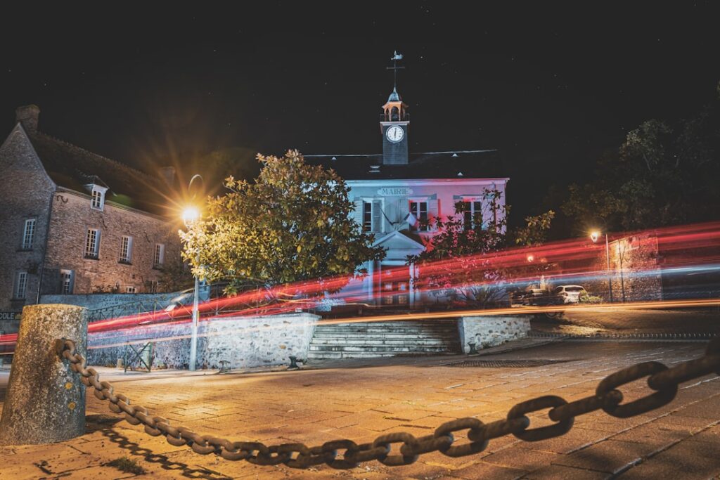 Building with light trails at night