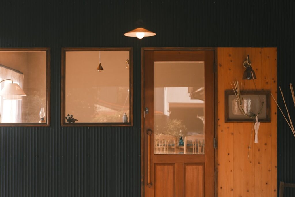 Exterior of a building with wooden door and windows