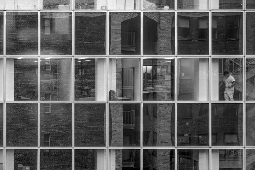 grayscale photo of glass window