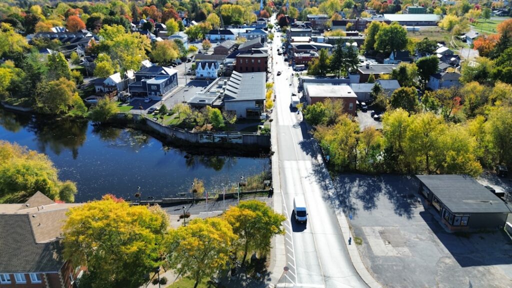 Aerial view of a small town with autumn foliage