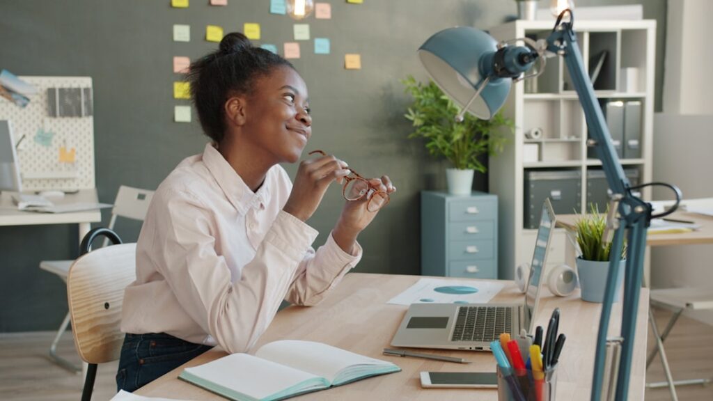 Young woman working at a desk in an office