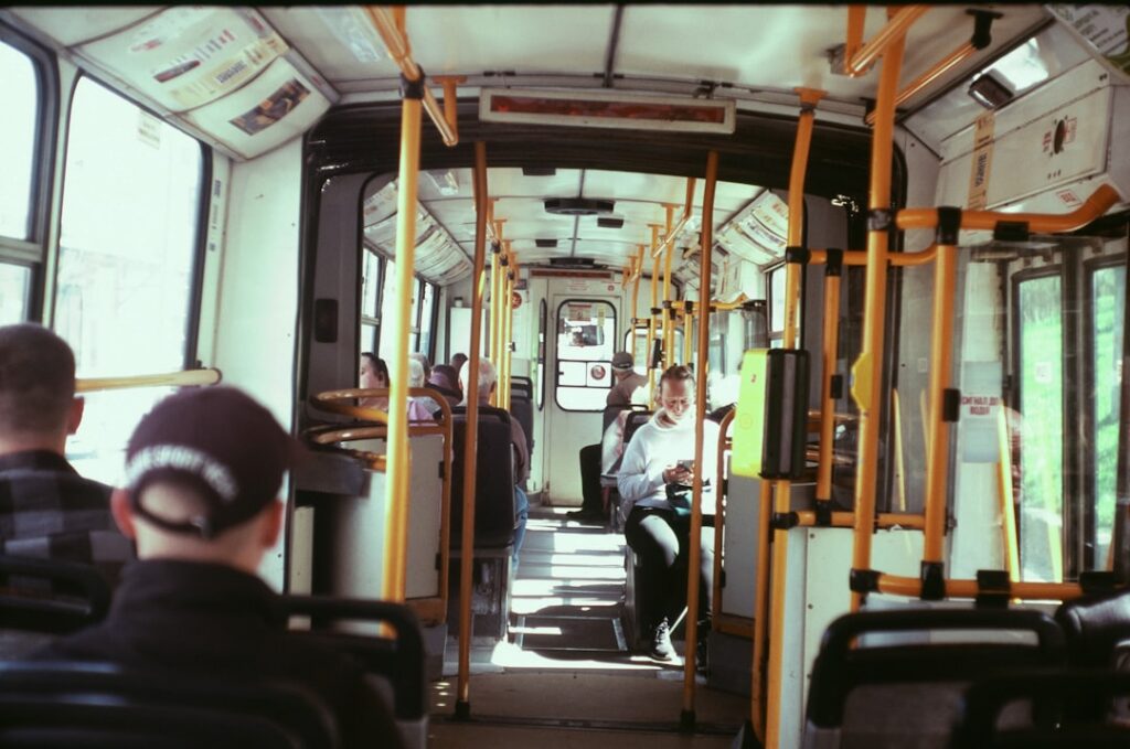 Interior view of a public bus with passengers
