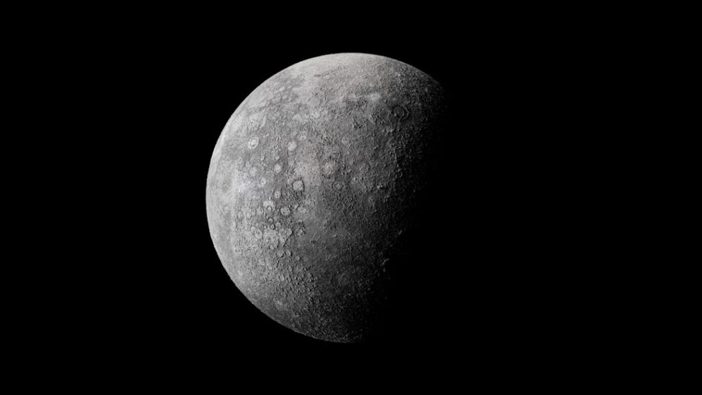 The moon in shadow in space.