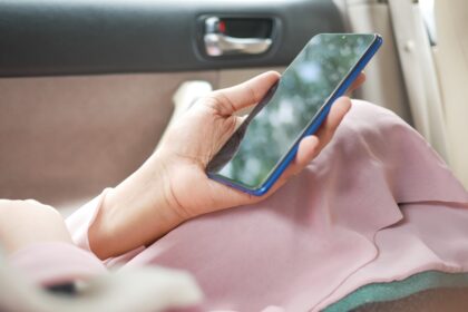 person holding black android smartphone