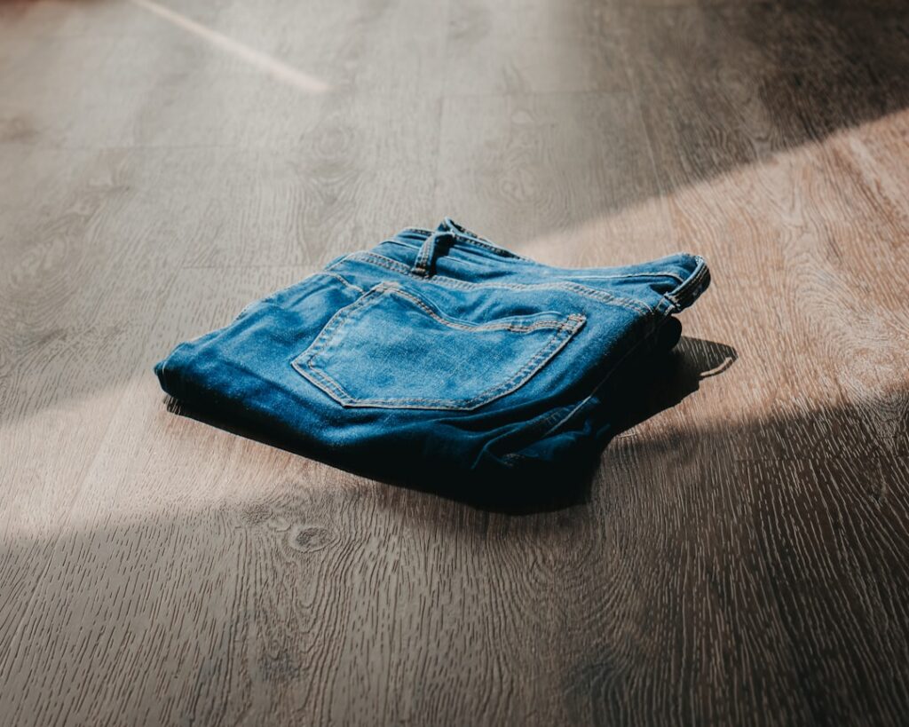 blue textile on brown wooden table