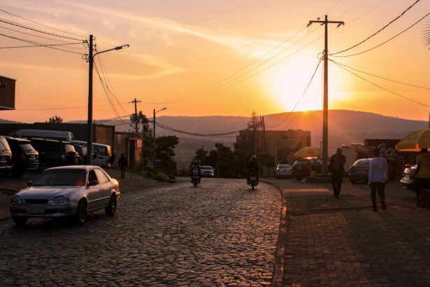 people walking on sidewalk during sunset