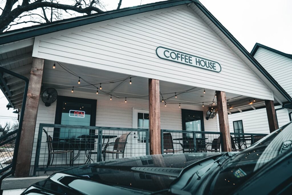 a car parked outside of a coffee house