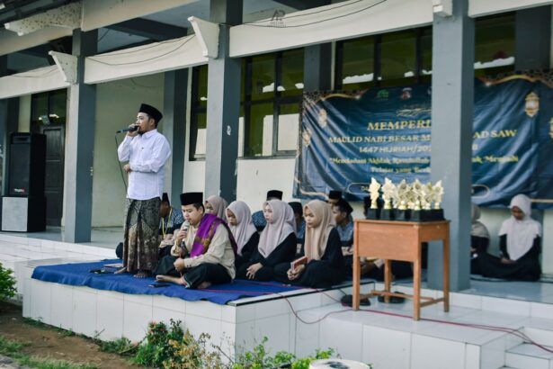 Young people participating in an outdoor event with trophies.