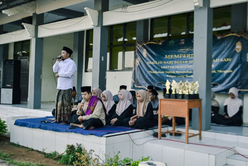 Young people participating in an outdoor event with trophies.